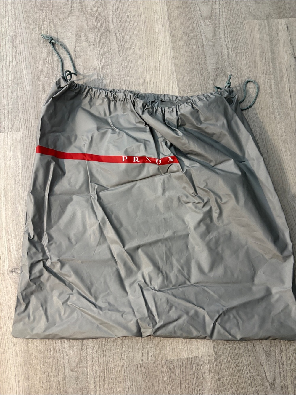 Prada Gray Nylon Drawstring Bag with Red Stripe